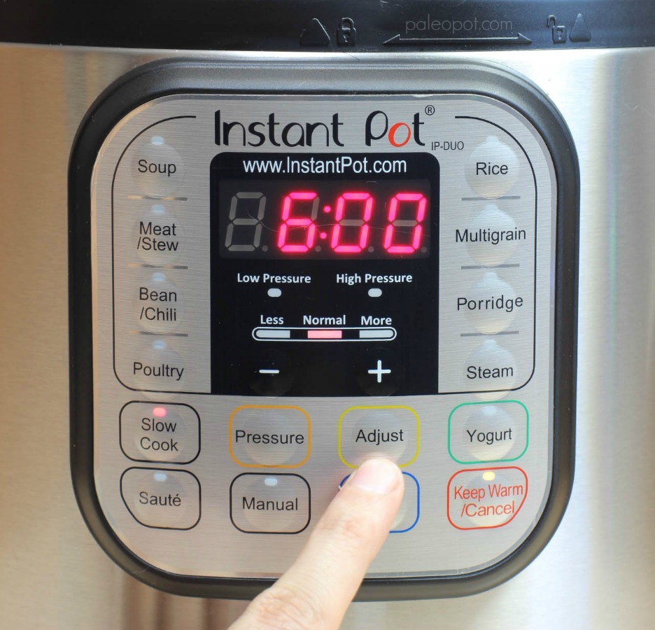 instant pot adjust button